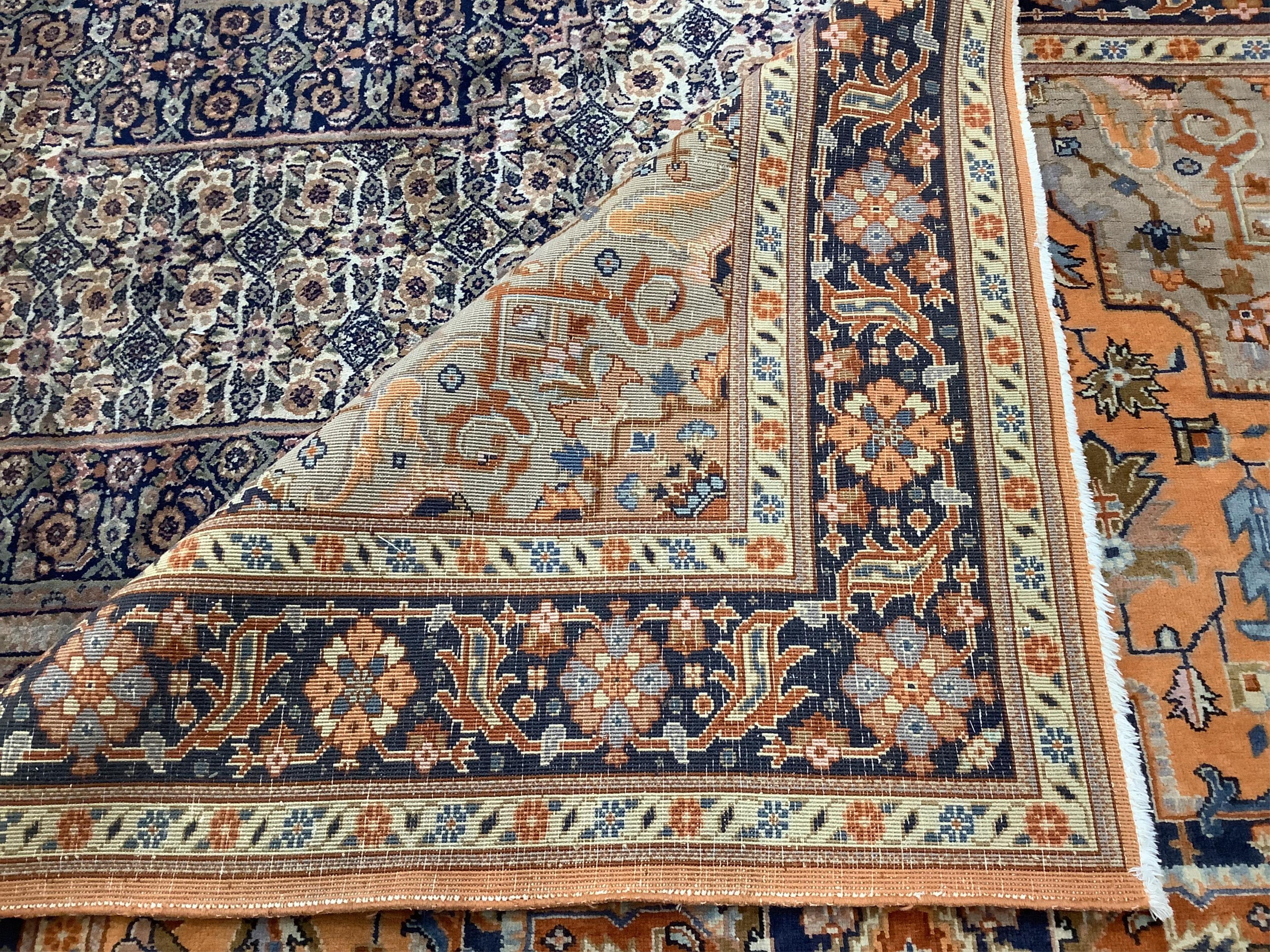 A North West Persian peach ground carpet, 270 x 204cm. Condition - fair